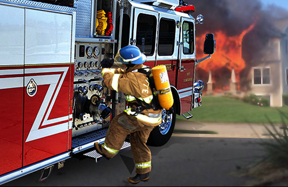 Firefighter climbing onto side of fire engine using step