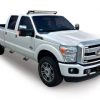 White Truck with Hoop II steps installed on the side